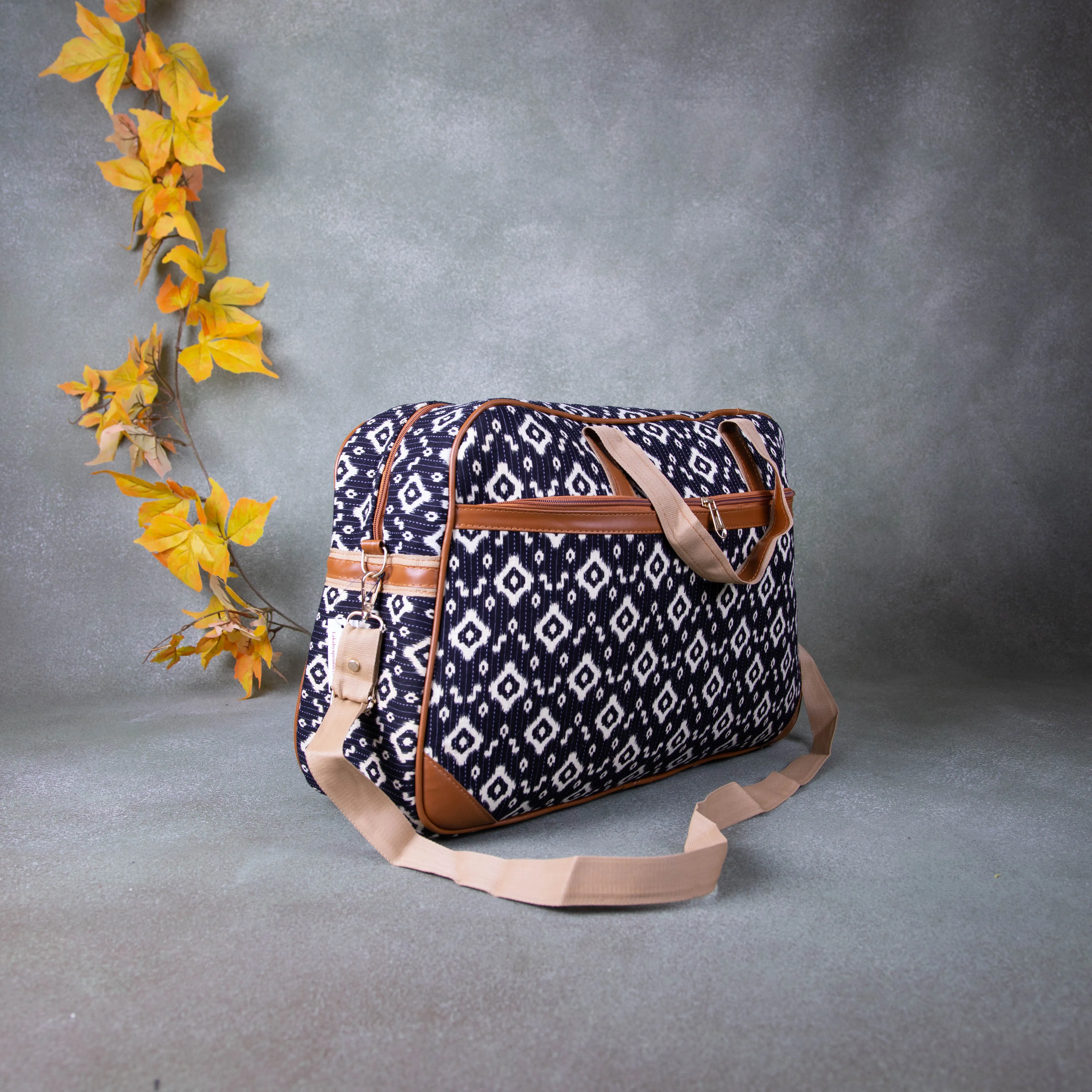Two Dayer bags Black Colour with White Diamond Design.