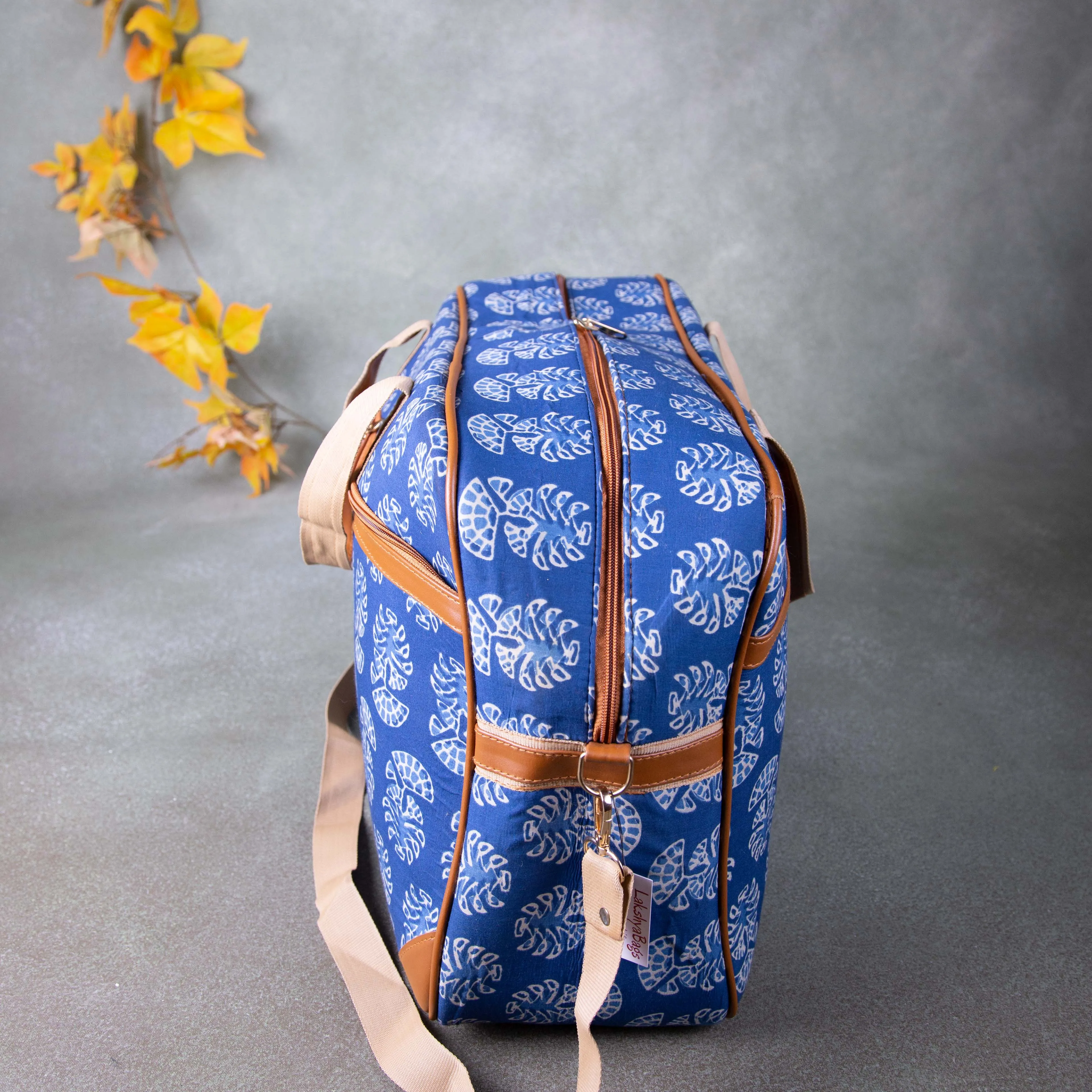 Two Dayer bags Blue with White Flower Design.