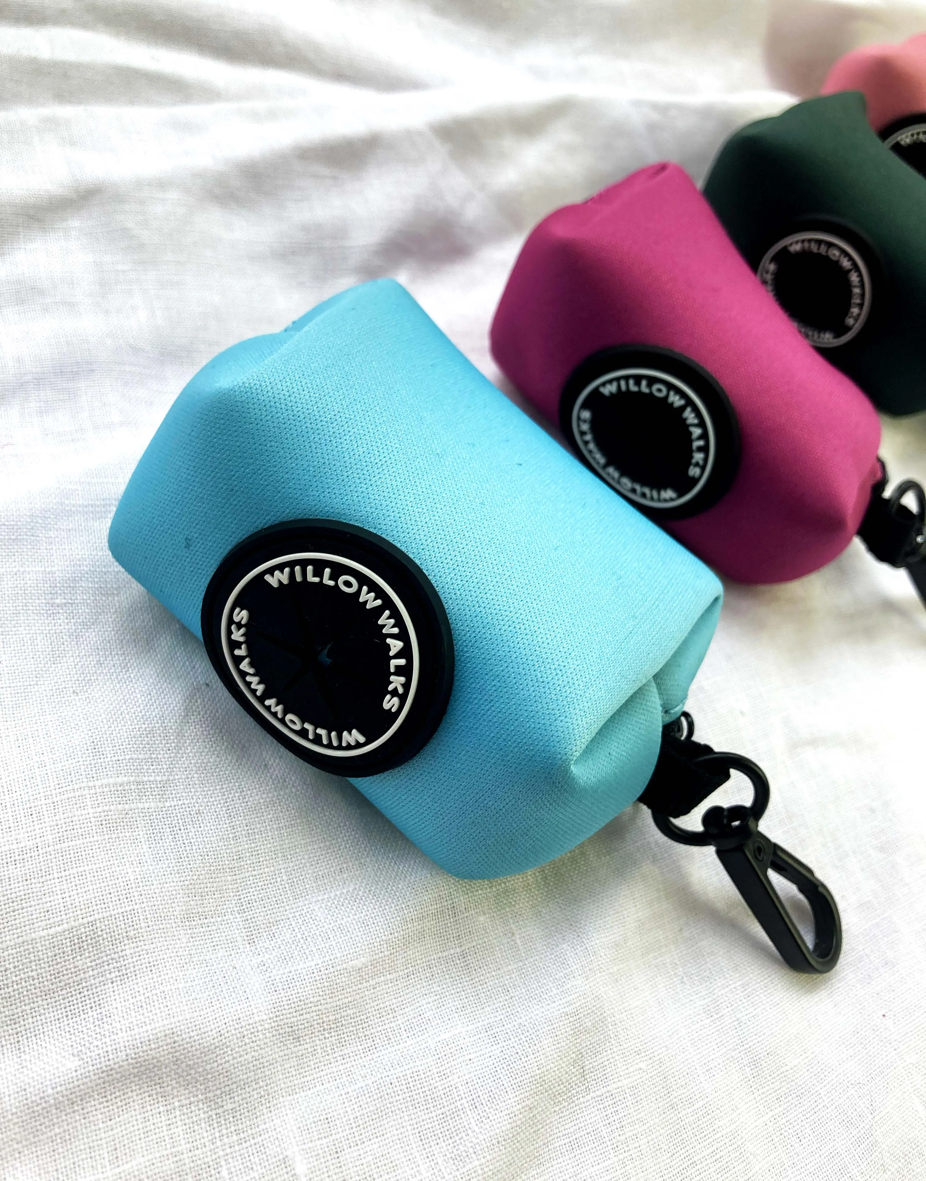 Willow Walks fabric poo bag in fuchsia